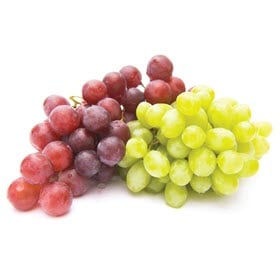 Two bunches of red and green grapes on a white background.
