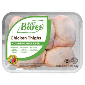 A package of Just Bare Family Pack Chicken Drumsticks or Thighs on a white background.